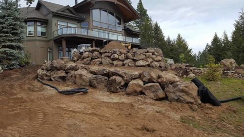 Boulder Retaining Wall with levels.