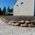 Boulder Retaining Wall to define roadway